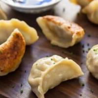 Handmade Dumplings · Fillings made with ground pork and chives, 1 order for 10 pieces.