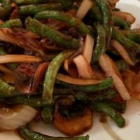 Szechuan Style String Beans · String beans, mushroom and sliced onions stir fried with house special brown sauce.