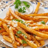 Greek Fries · Seasoned fries with feta cheese and side of tzaziki