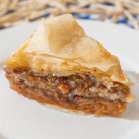 Home Made Baklava · Mixed nuts ( walnuts and almonds), fine phyllo dough, butter, honey syrup flavored with oran...