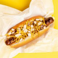Chili Cheese Dog · Hot dog smothered in chili and shredded cheese, served on a fluffy bun.