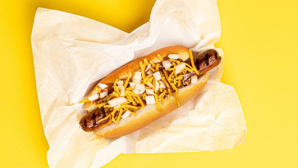 Chili Cheese Dog · Hot dog smothered in chili and shredded cheese, served on a fluffy bun.