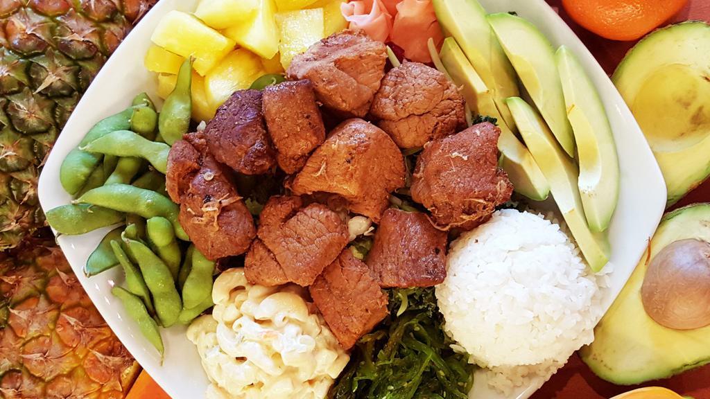 Roasted Pork Plate · Gluten-free. Roasted and seared pork shoulder with Hawaiian sea salt and huli huli teriyaki sauce. Served with rice and one side of salad of your choice.