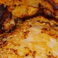 Hawaiian Chicken · Marinated chicken thigh with Hawaiian sea salt and hickory smoke.