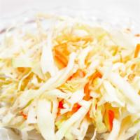 Cole Slaw · Sweet cabbage, carrots and coleslaw dressing.