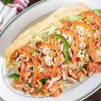 Grilled Chicken Salad · Tender pieces of charbroiled chicken. served in a fried flour tortilla with lettuce tomatoes...