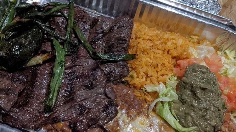 Carne Asada · Skirt steak broiled in a special way. served with guacamole.