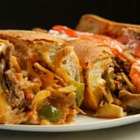 Buffalo Chicken Cheese Steak · Delicious chicken cheese steak made with chicken, white American cheese, grilled onions, and...