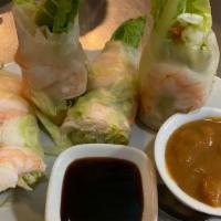 Fresh Spring Rolls (4 Pcs./Serving) · Rice paper rolls wrapped with romaine lettuce, carrots, cucumber, and fresh Thai basil. Serv...