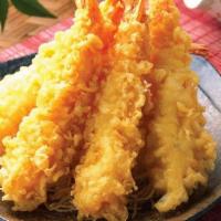 Shrimp Tempura (6 Pcs./Serving) · Deep-fried crispy Tempura shrimp fried to a golden brown and served with sweet and sour sauce.