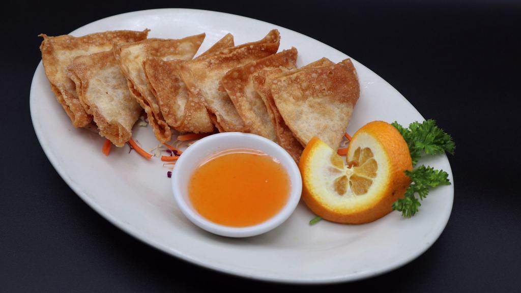 Fried Wontons (8 Pcs./Serving) · Deep-fried marinated ground pork wrapped in wonton paper, served with sweet and sour sauce.