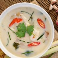 Tom Kha · Creamy, spicy, slightly sweet, and sour soup. Coconut milk and lemongrass broth with mushroo...