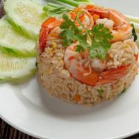 Fried Rice · Your choice of meat stir-fried with Thai jasmine rice, egg, onions, green onions, and tomato...