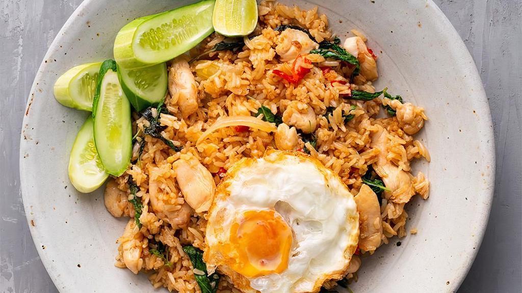Spicy Fried Rice · Your choice of meat stir-fried with Thai jasmine rice, onions, bell peppers, and Thai basil.