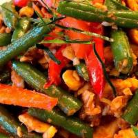 Red Curry Stir-Fry / Pad Ped · Stir-fried Thai basil, bell pepper, green beans, bamboo shoot, kaffir lime leaves, zucchini,...