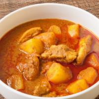 Massaman Curry / Kaeng Massaman · Coconut milk, potatoes, carrots, white onions, peanuts, and your choice of meat.