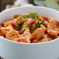 Panang Curry / Kaeng Panang · Coconut milk, bell peppers, peas, carrots, your choice of meat, and fresh leaves of basil fo...