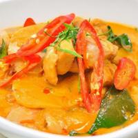 Red Curry / Kaeng Daeng · Coconut milk, bamboo shoots, bell peppers, your choice of meat, and fresh basil leaves for f...