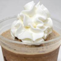 Frozen Mocha Coffee · Special ice blended coffee drink draped with chocolate and topped with whipped cream.