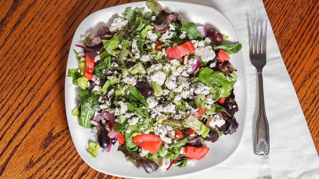 Side Greek Salad · Blend of romaine lettuce, tomatoes, red onions, cucumbers, feta cheese, pitted black Kalamata olives, pepperchine and our homemade Greek dressing.