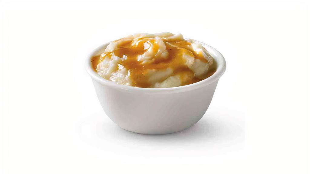 Mashed Potatoes · Before you even get to the potatoes, let’s talk about silky, savory, rich gravy. OK, now that we’ve done that, imagine it poured over a generous portion of smooth, whipped, delicious mashed potatoes.