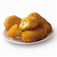 Jalapeño Cheese Bombers® · Bomb your taste buds with fried spicy jalapeño bits and creamy cheddar cheese. More than jus...