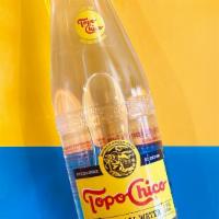 Topo Chico · Natural sparkling spring water with a unique blend of minerals from Mexico.