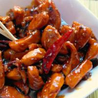 General Tso'S Chicken · Spicy. Tender chunks of boneless chicken marinated in chili hot sauce with rice.
