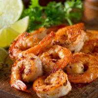 Shrimp Scampi · Grilled shrimp tossed in a garlic, buttery wine sauce.