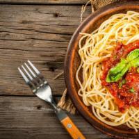 Spaghetti A La Marinara · Traditional marinara sauce with garlic, fresh basil, tomato and parmesan cheese.