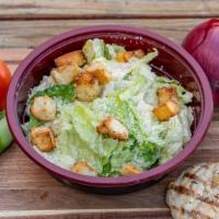 Caesar Salad · Romaine lettuce tossed with Caesar dressing, Parmesan cheese, and croutons. Add-ons for an a...