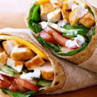 Buffalo Chicken Wrap · Romaine lettuce topped with diced tomatoes, cheddar Jack cheese, cucumbers, red onions, and ...