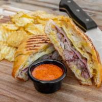 Cuban Sandwich · Pulled pork, mustard, ham, pickles, and provolone cheese.