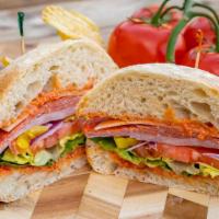 Italian Cold Cut Sandwich · Salami, pepperoni, ham, provolone, banana peppers, onion, tomato, lettuce and tomato aioli.