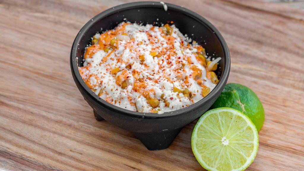 Street Corn In A Cup · Corn, melted butter, spicy mayo, and Cotija cheese.