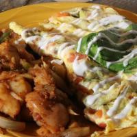 California Omelette · Most popular dishes. Applewood smoked bacon, mushrooms, green onion, tomatoes, Jack and Ched...