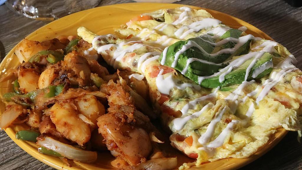 California Omelette · Most popular dishes. Applewood smoked bacon, mushrooms, green onion, tomatoes, Jack and Cheddar cheese, topped with sour cream and sliced avocado.