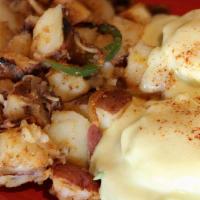 California · Most popular dishes. Appetizing poached eggs, avocado, applewood smoked bacon and tomatoes o...