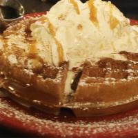 Churro Waffle · Most popular dishes. A tempting scoop of vanilla bean ice cream, topped with whipped cream, ...