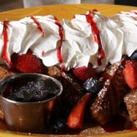 Berry Berry French Toast · Most popular dishes. Fresh blackberries, strawberries and blueberries topped with whipped cr...