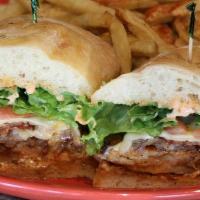 Cajun Chicken Sandwich · Most popular dishes. Spicy Cajun style grilled chicken, lettuce, Swiss cheese, tomato, apple...
