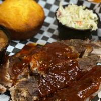 Warthog Barbeque Ribs · Slow smoked Ribs / seasoned /  top with our Warthog Barbeque Sauce
