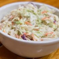 Homestyle Coleslaw · Cut Cabbage with carrots and red cabbage toss in our coleslaw dressing with a slight bite