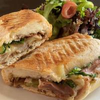 Brie Bartlet Panini · Prosciutto ham, brie cheese, caramelized onions and pears, olive oil, balsamic vinegar, roas...