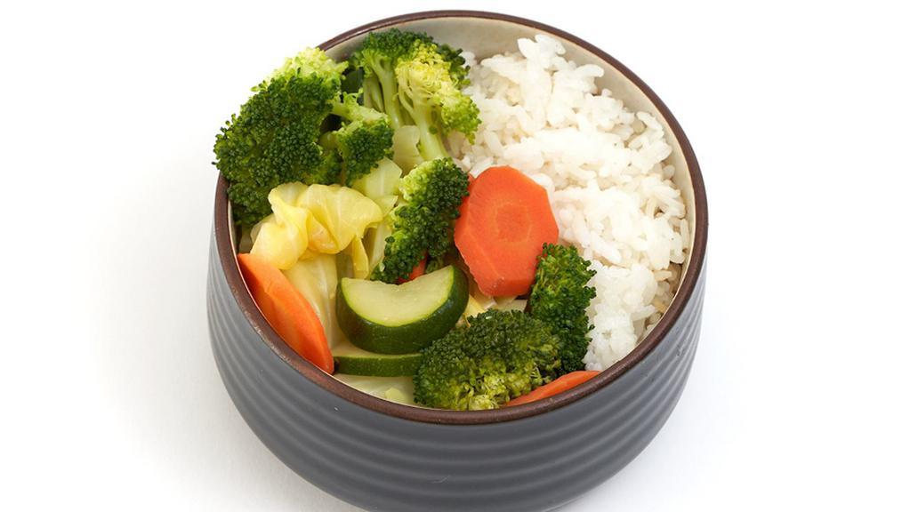 Veggie Bowl · A medley of steamed veggies (cabbage, zucchini, broccoli, &.  carrots) served on a bed of rice.