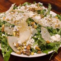 Arugula Salad · Organic arugula, bosc pear, pistachios, goat cheese, date vinaigrette (vegan)