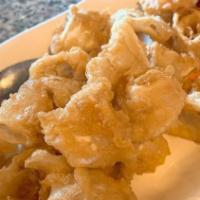 Fried Calamari · Deep fried lightly breaded calamari.
