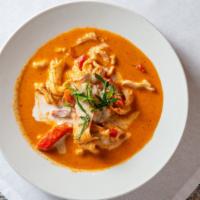Panang Curry · Think red curry paste with coconut milk, lime leaves, bell pepper.