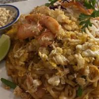 Crab Pad Thai · Real crab meat, rice noodles, egg, bean sprouts, peanuts.