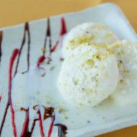 Rasmalai · Flattened balls of Indian cottage cheese cooked in sugar syrup and dunked in sweetened thick...